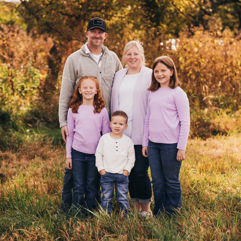 Wolfe Family photo outdoors with fall colors